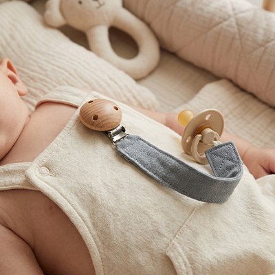 Attache tetine mignonne en silicone souple, design adorable pour bébé