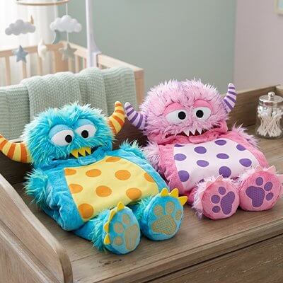 Deguisement bebe : peluches monstres colorées pour enfants adorables et câlins.