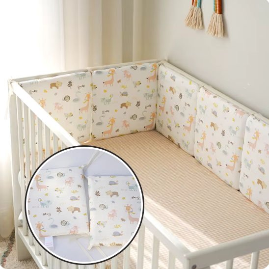 Tour de lit bebe avec motifs animaliers pour un sommeil sécurisé et paisible.